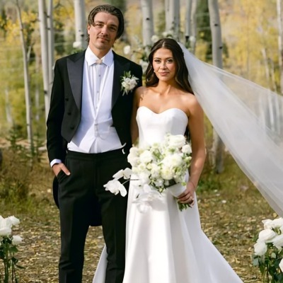 Caelynn Miller-Keyes and her spouse, Dean Unglert, posed in their wedding dress.